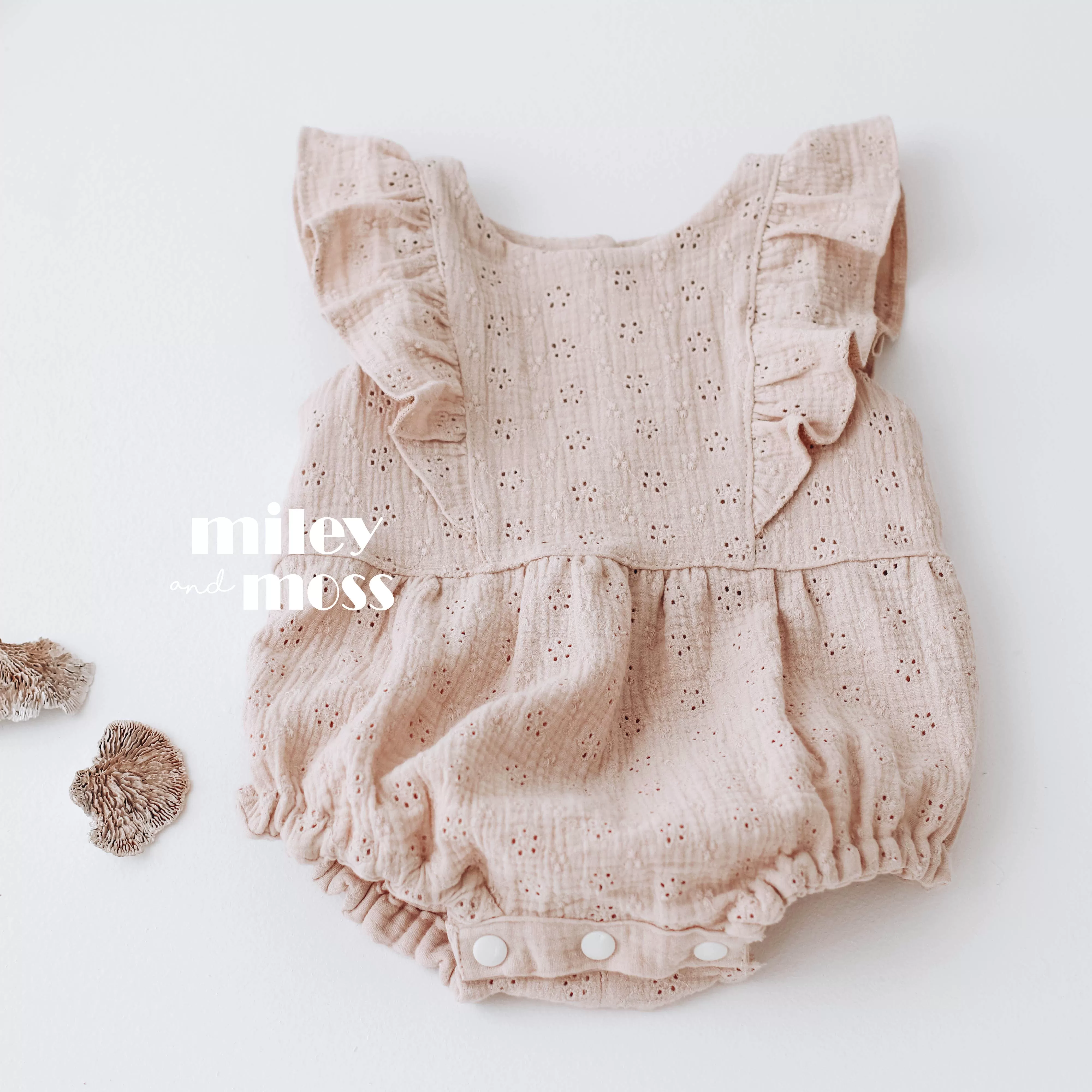 Embroidered muslin romper with frills