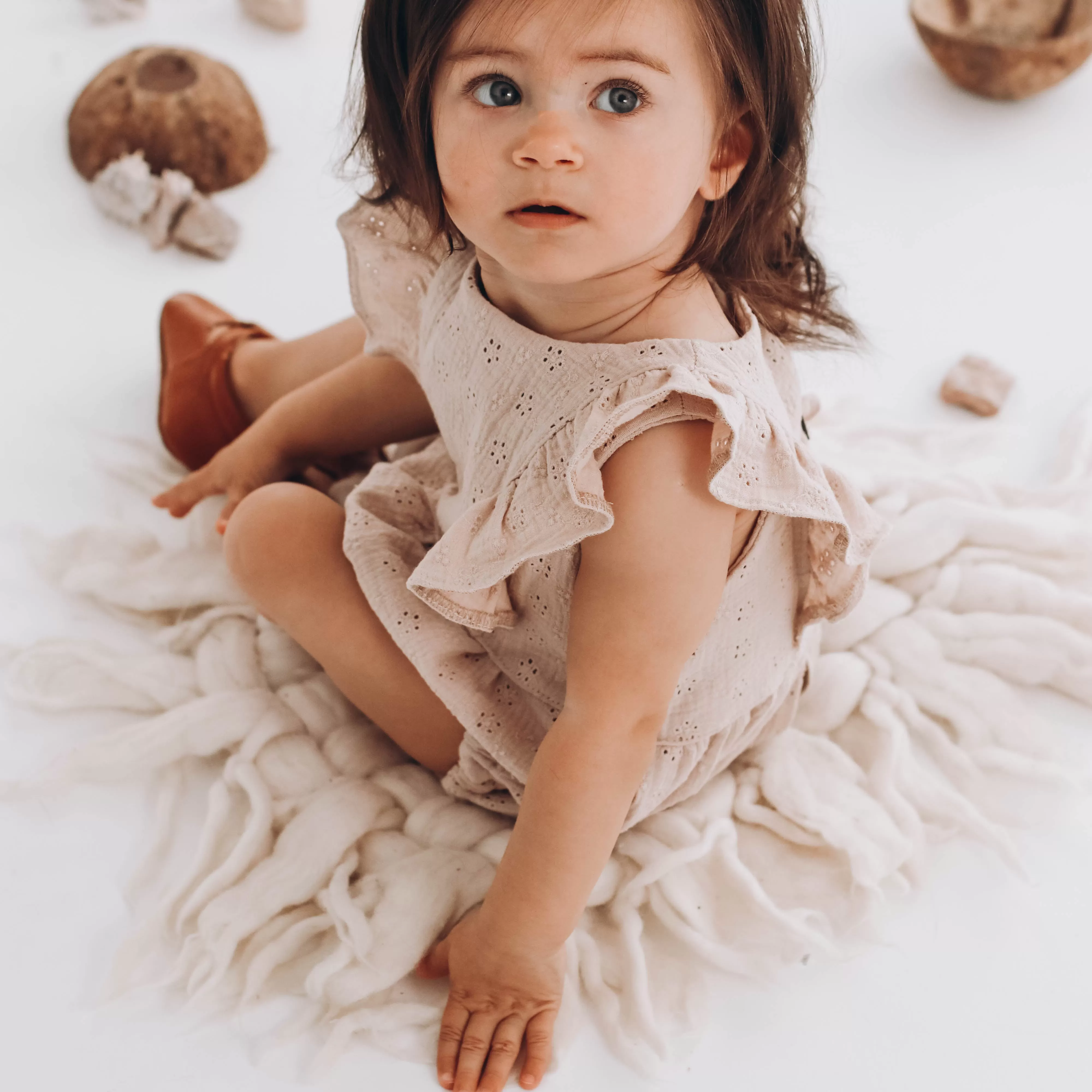 Embroidered muslin romper with frills